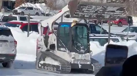 man driving skid steer|'On a rampage': Video shows Nebraska man slam Bobcat into .